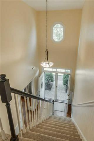 892 General George Patton Road, Unit 892 Nashville, TN 37221 - Photo 12 of 20 a view of entryway and hall with wooden floor