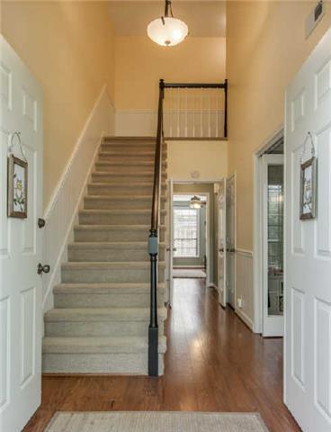 892 General George Patton Road, Unit 892 Nashville, TN 37221 - Photo 2 of 20 a view of entryway and hall with wooden floor