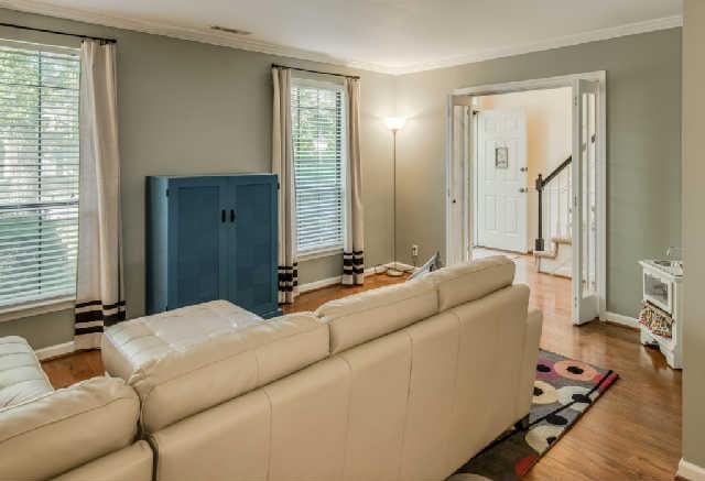 892 General George Patton Road, Unit 892 Nashville, TN 37221 - Photo 3 of 20 a living room with furniture and a large window