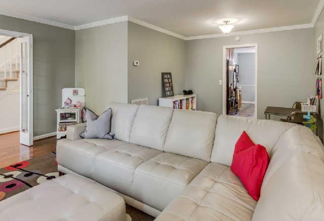 892 General George Patton Road, Unit 892 Nashville, TN 37221 - Photo 4 of 20 a living room with furniture and a couch