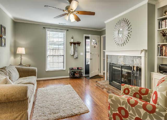 892 General George Patton Road, Unit 892 Nashville, TN 37221 - Photo 9 of 20 a bedroom with furniture and a fireplace