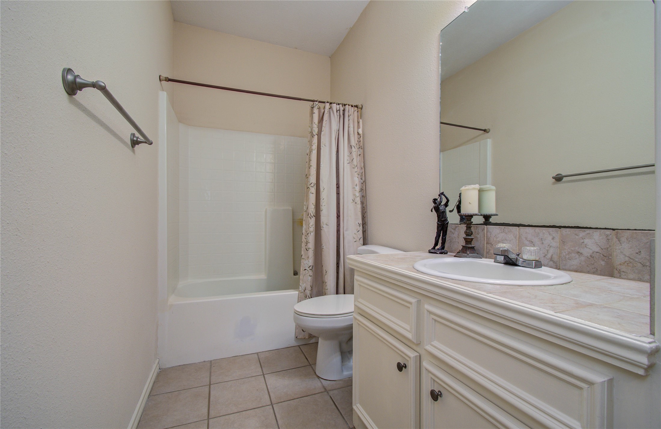 10822 Sail View Street Montgomery, TX 77356 - Photo 21 of 29 a bathroom with a sink a toilet and shower