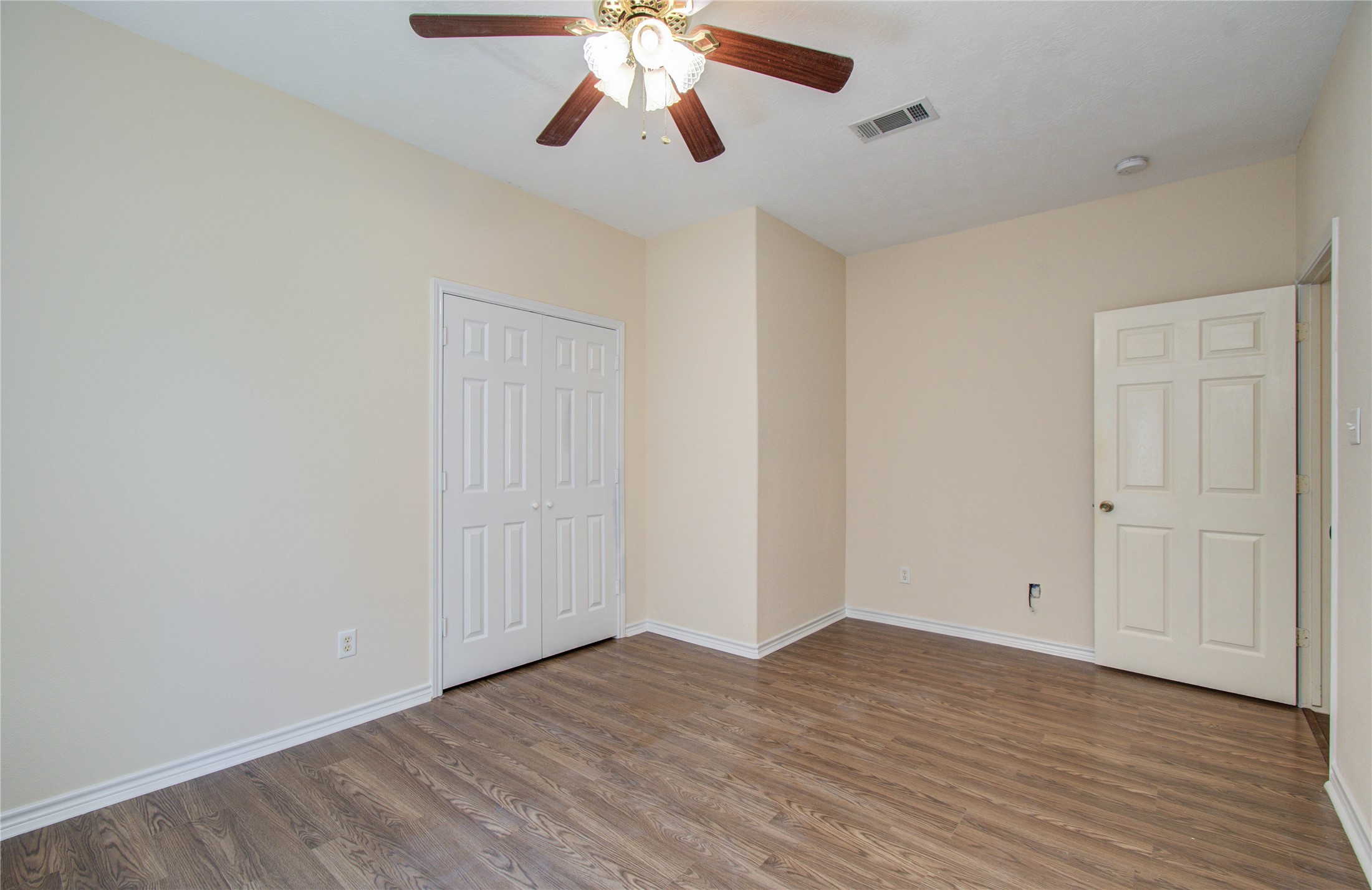 10822 Sail View Street Montgomery, TX 77356 - Photo 24 of 29 a view of an empty room with wooden floor