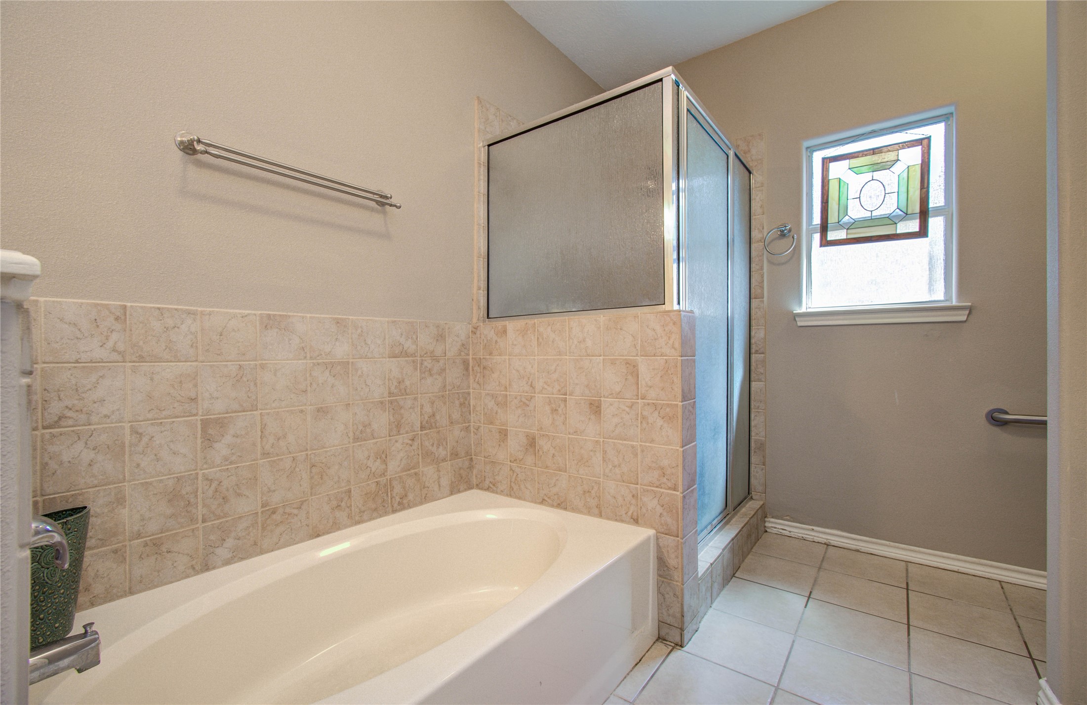 10822 Sail View Street Montgomery, TX 77356 - Photo 27 of 29 a bathroom with a bathtub and a shower