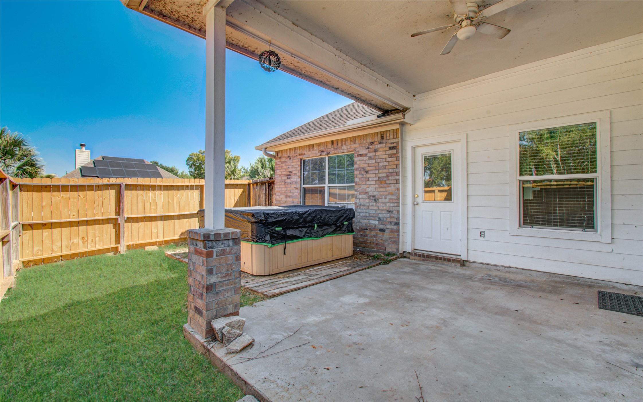 10822 Sail View Street Montgomery, TX 77356 - Photo 29 of 29 a view of an house with backyard and a tub