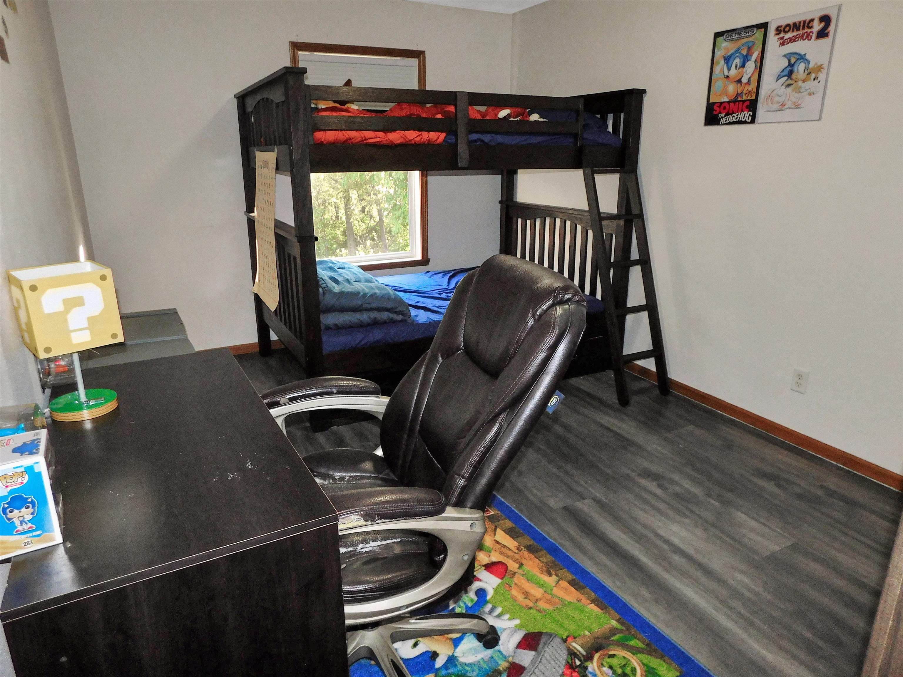 558 Mosaic Lane, Unit 1 Roscoe, IL 61073 - Photo 18 of 28 a view of a workspace with furniture and a window