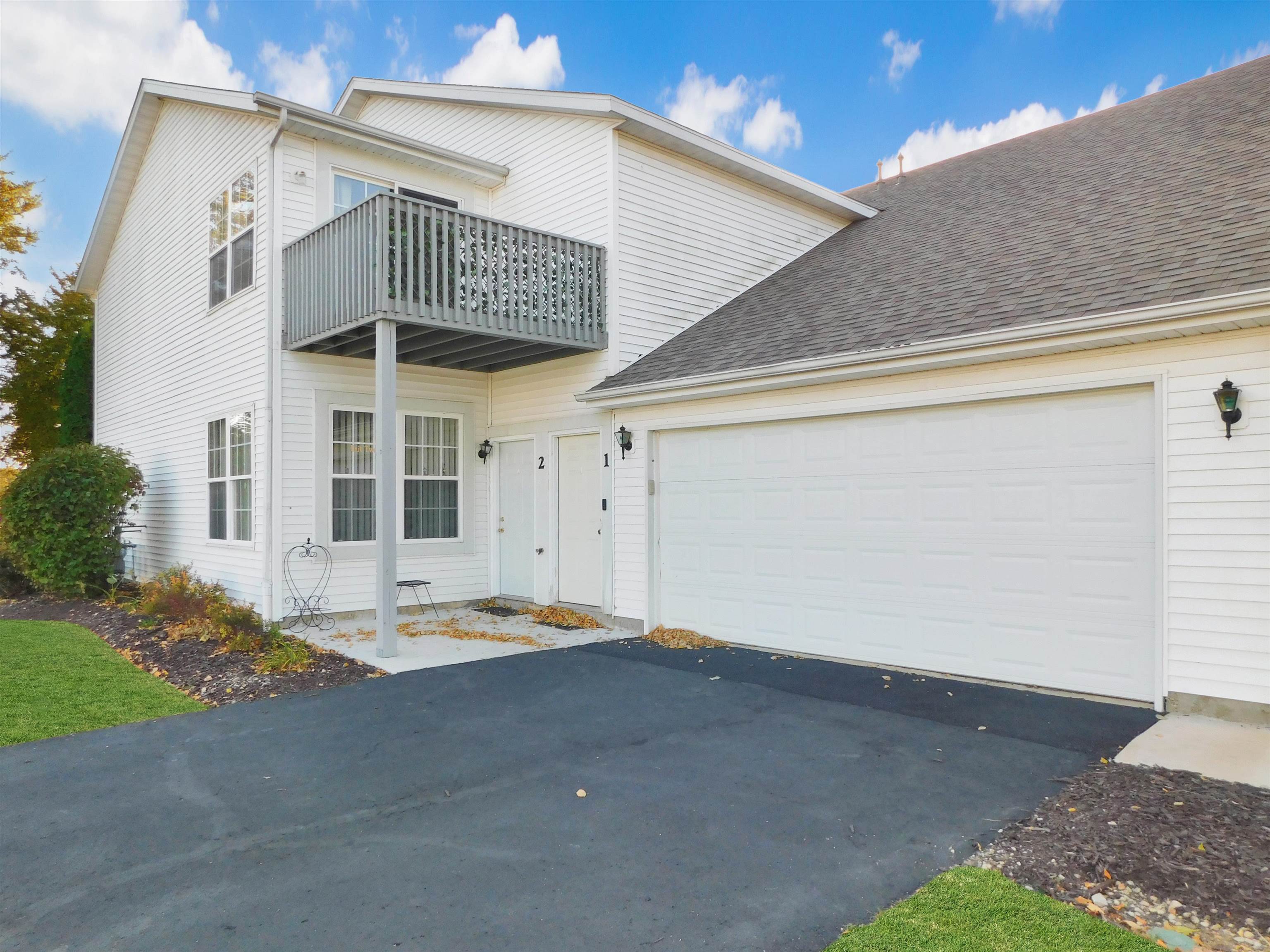 558 Mosaic Lane, Unit 1 Roscoe, IL 61073 - Photo 2 of 28 a view of a house with a street