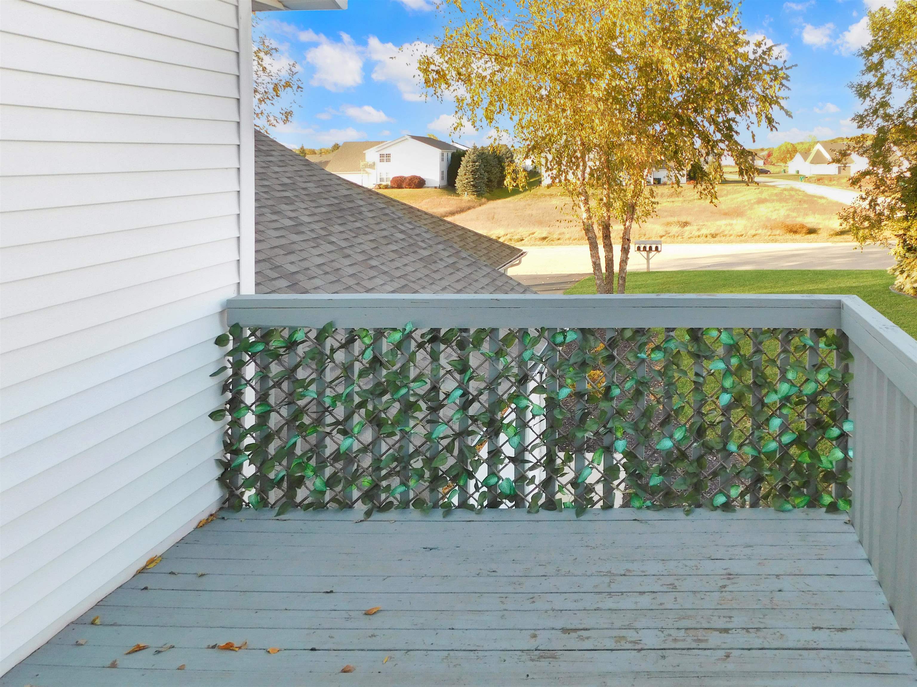 558 Mosaic Lane, Unit 1 Roscoe, IL 61073 - Photo 23 of 28 a view of a lake from a balcony