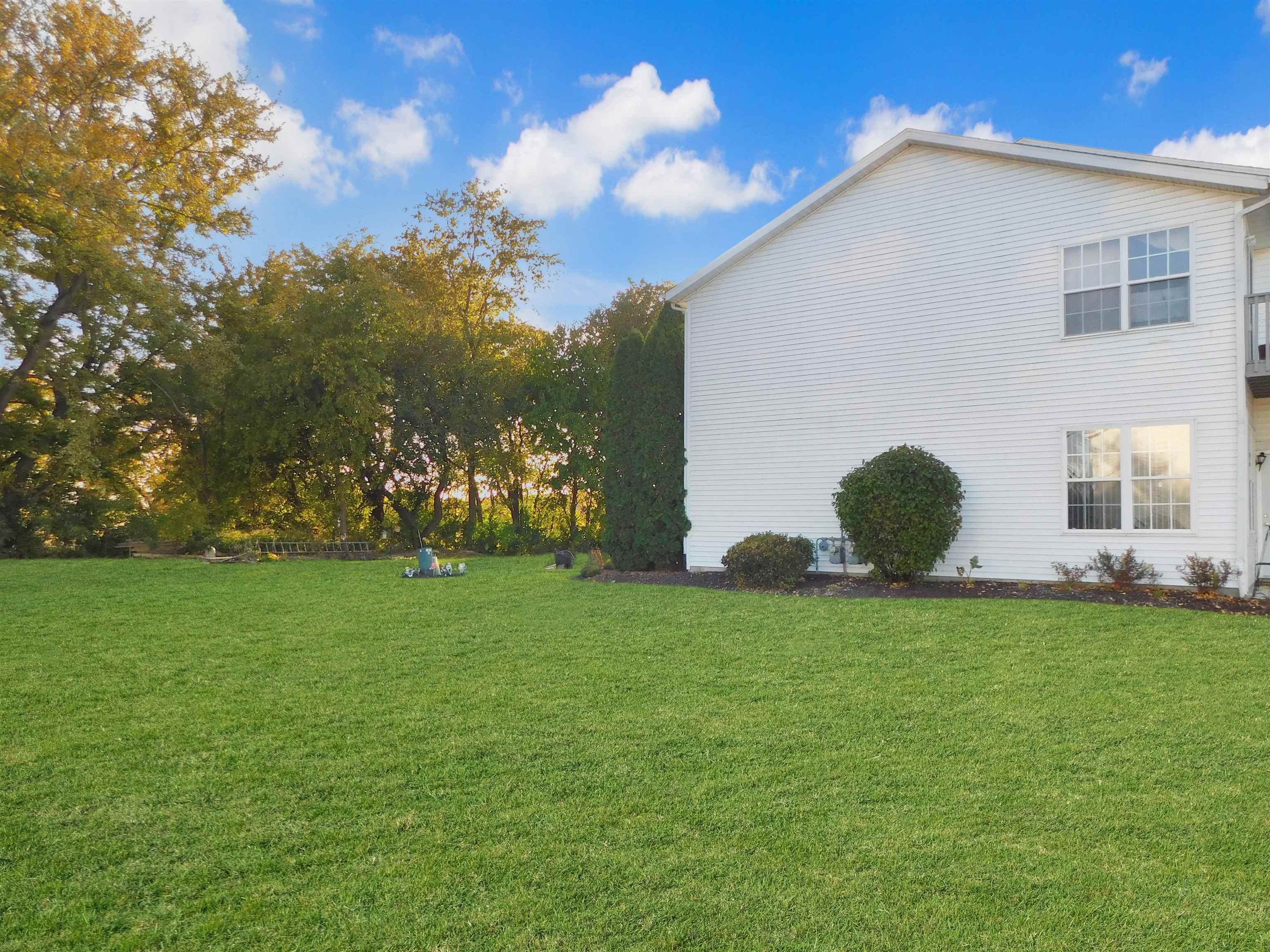 558 Mosaic Lane, Unit 1 Roscoe, IL 61073 - Photo 26 of 28 a view of a backyard