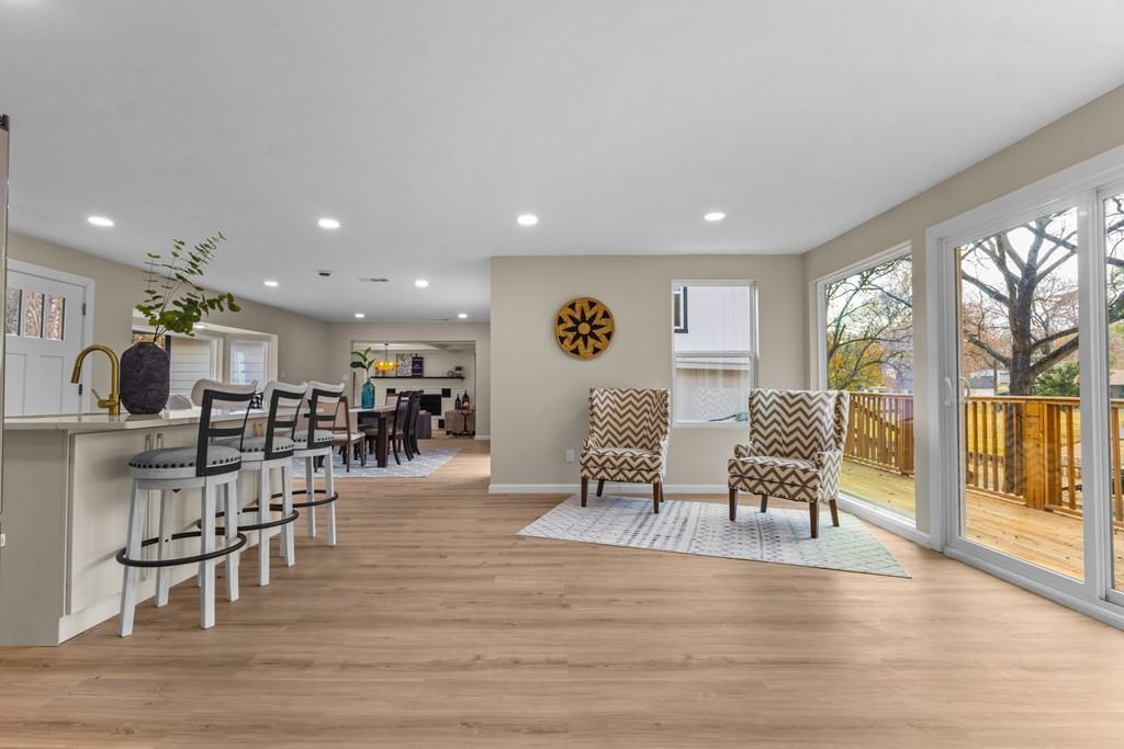 2155 Hickory Trace Mabank, TX 75156 - Photo 18 of 40 a living room with furniture and a table
