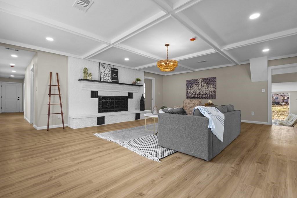 2155 Hickory Trace Mabank, TX 75156 - Photo 25 of 40 a living room with furniture and a fireplace