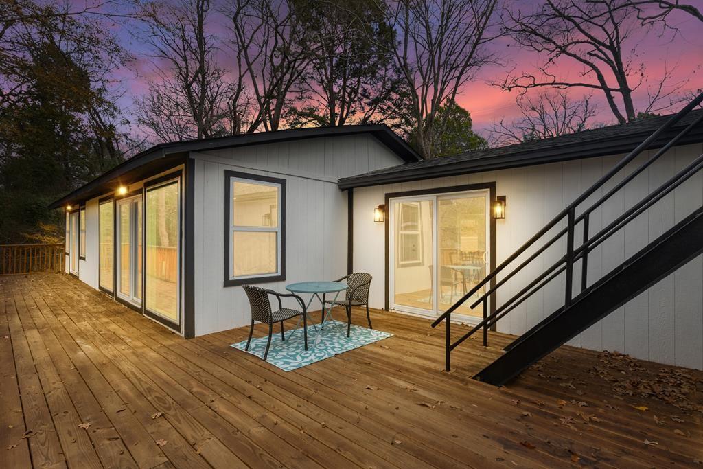2155 Hickory Trace Mabank, TX 75156 - Photo 3 of 40 a view of outdoor space with wooden floor and fence