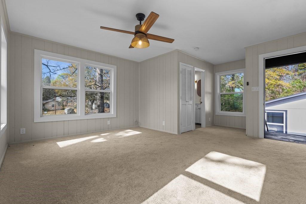 2155 Hickory Trace Mabank, TX 75156 - Photo 34 of 40 wooden floor in an empty room with a window