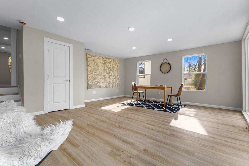 2155 Hickory Trace Mabank, TX 75156 - Photo 38 of 40 a living room with furniture and a wooden floor