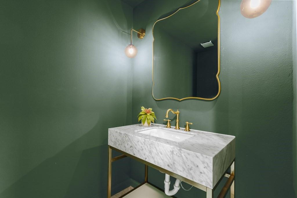 2155 Hickory Trace Mabank, TX 75156 - Photo 40 of 40 a bathroom with a sink and a mirror