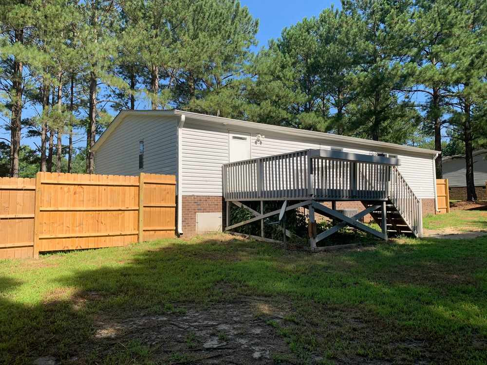 8834 Creek Road Willow Spring, NC 27592 - Photo 19 of 20 Large Deck for Entertaining