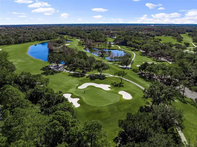 an aerial view of a golf course with a yard