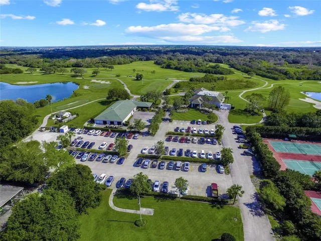 a view of a park with plants and trees