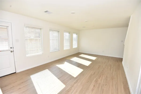 a view of an empty room and window
