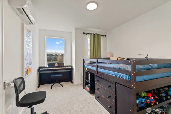 a view of storage and utility room with washer and dryer