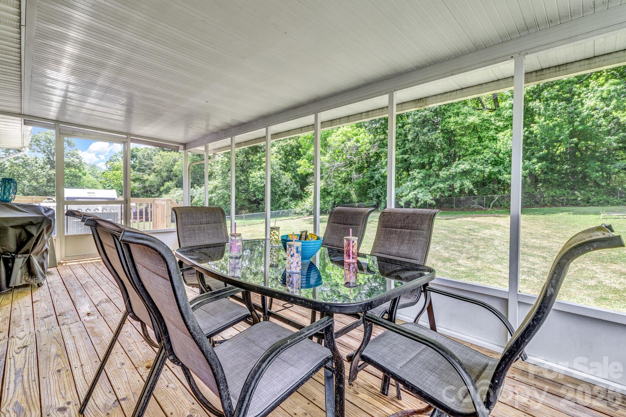 13 Spring Lake Drive Fletcher, NC 28732 - Photo 18 of 30 a view of a dining room with furniture window and outside view