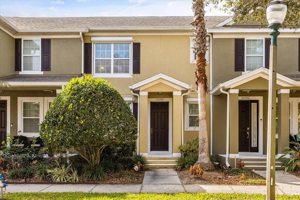 10096 Hartford Maroon Road Orlando, FL 32827 - Photo 1 of 1 front view of a house with a yard