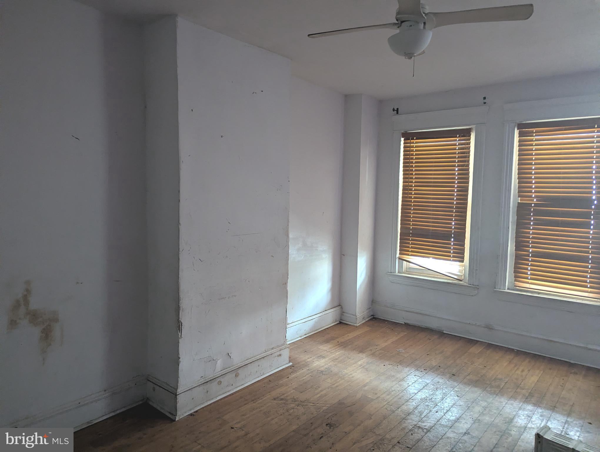 3838 Cambridge Street Philadelphia, PA 19104 - Photo 4 of 10 an empty room with a window