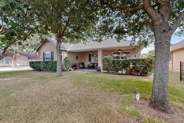 a outdoor living space with furniture and garden view