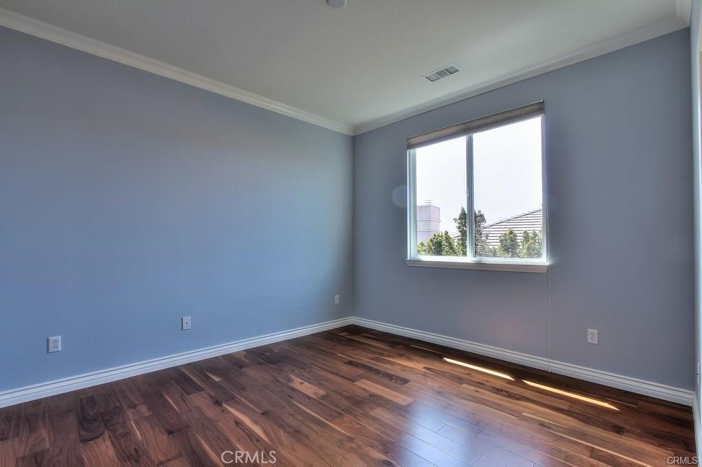 11516 Venezia Way Porter Ranch, CA 91326 - Photo 20 of 35 wooden floor in an empty room with a window
