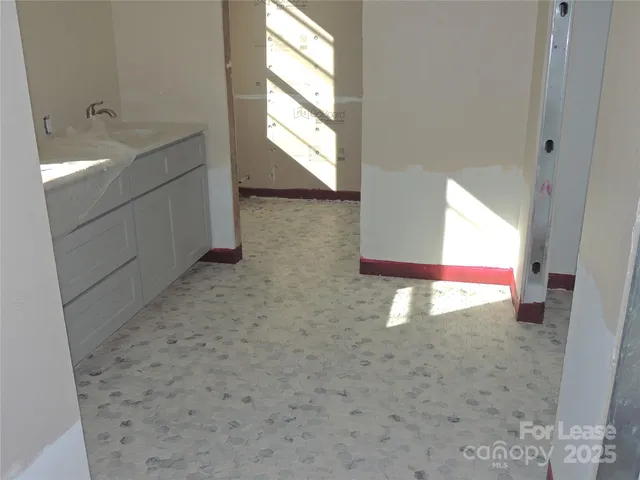 a bathroom with a sink and a bathtub