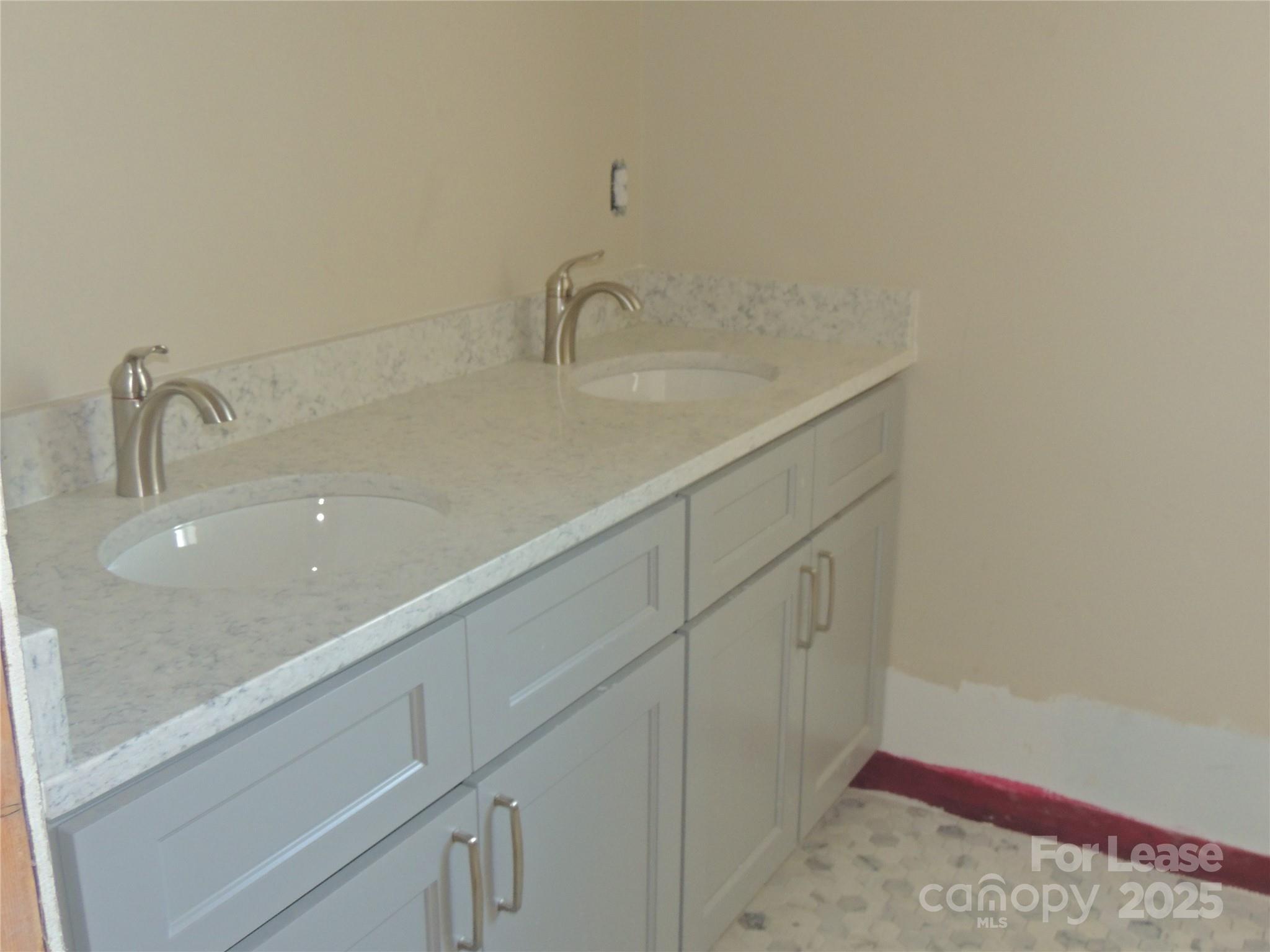 126 West Court Street Rutherfordton, NC 28139 - Photo 4 of 6 a bathroom with a sink and vanity