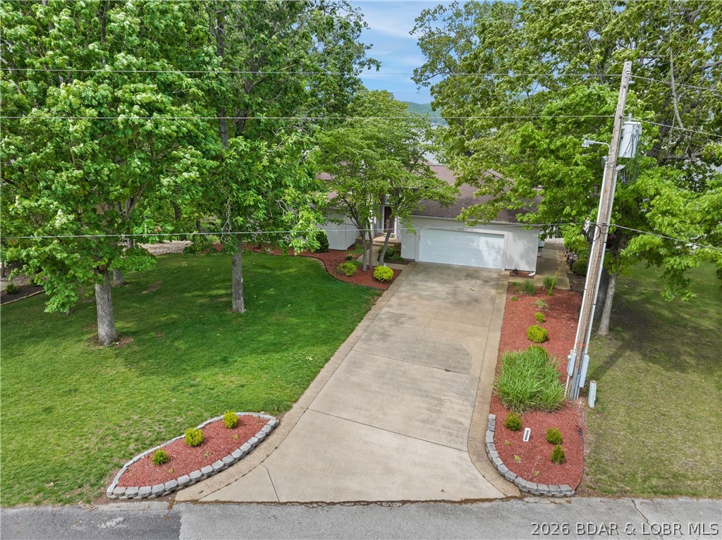 2209 Standing Rock Road Camdenton, MO 65020 - Photo 6 of 70 Concrete Drive/ nice Landscaping