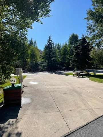 a view of swimming pool with seating space