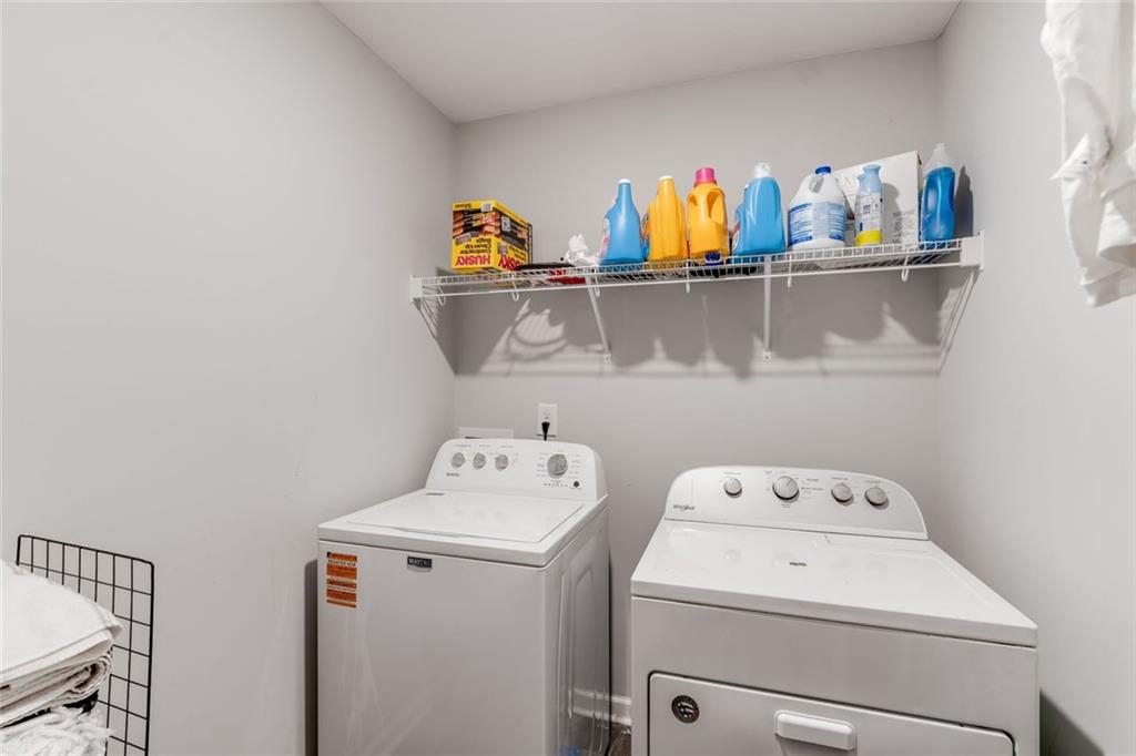 227 Waters Edge Parkway Temple, GA 30179 - Photo 15 of 26 a utility room with dryer and washer