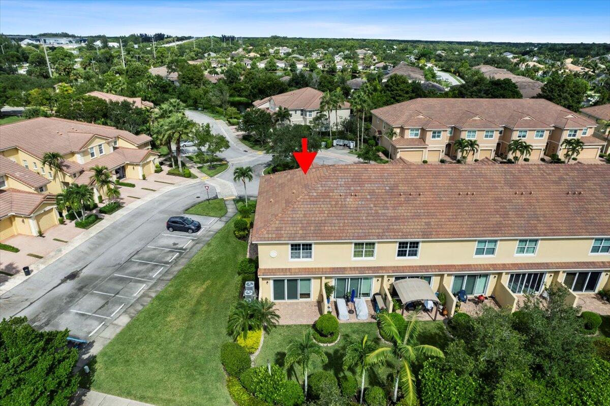 692 Southwest Glen Crest Way Stuart, FL 34997 - Photo 34 of 37 a aerial view of a house with a yard