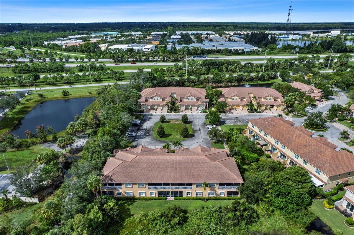 692 Southwest Glen Crest Way Stuart, FL 34997 - Photo 35 of 37 an aerial view of a house with a yard