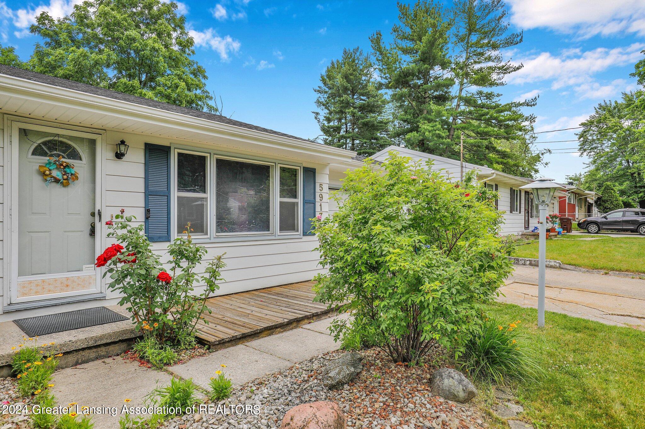 5917 Kyes Road Lansing, MI 48911 - Photo 3 of 31 31-web-or-mls-Open Ended Media-31