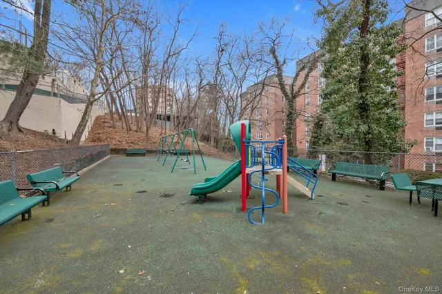a view of outdoor space with table and chairs