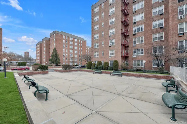 a view of a building with a yard