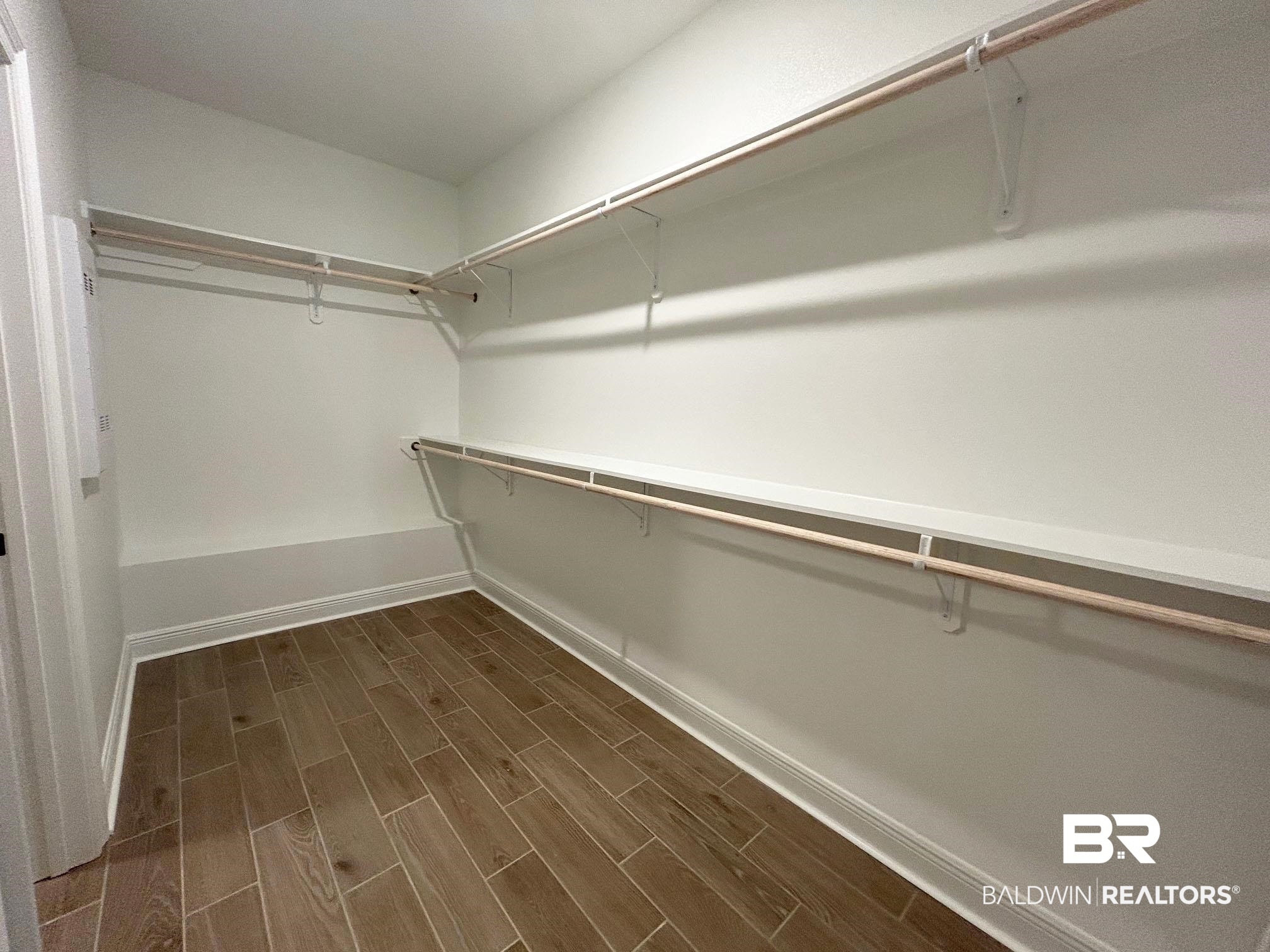 877 Sumter Loop Foley, AL 36535 - Photo 11 of 18 Walk in closet featuring wood finish floors