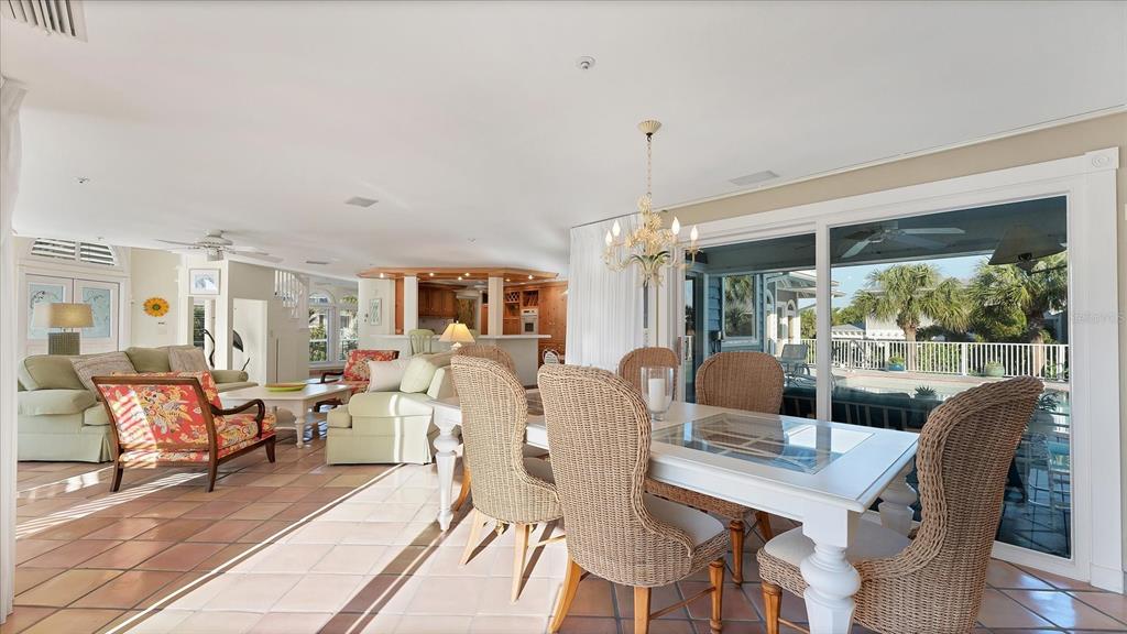 402 Lafitte Street Boca Grande, FL 33921 - Photo 14 of 40 a view of a dining room with furniture window and outside view