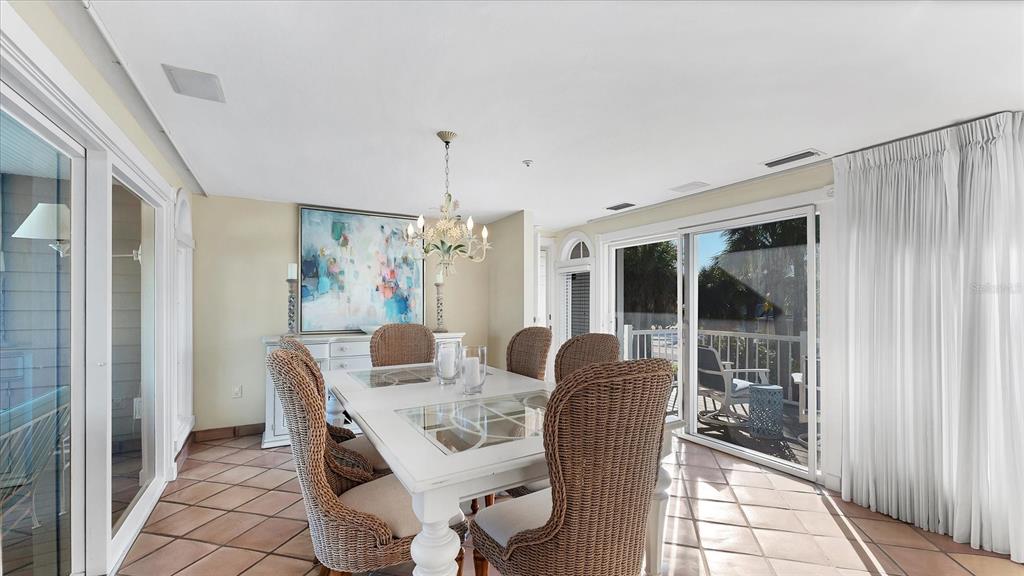 402 Lafitte Street Boca Grande, FL 33921 - Photo 15 of 40 a dining room with furniture and window