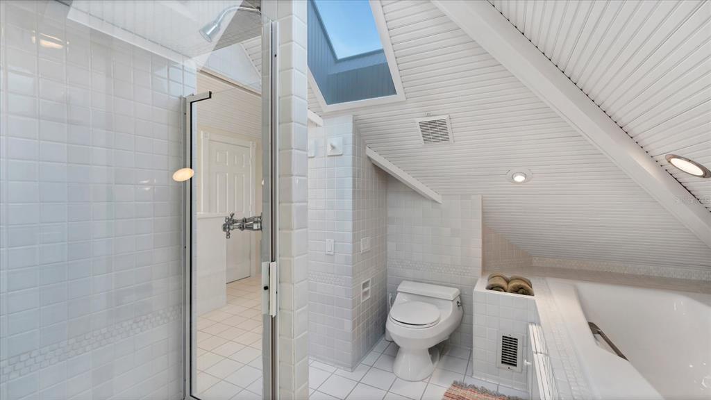 402 Lafitte Street Boca Grande, FL 33921 - Photo 30 of 40 a bathroom with a toilet and a shower