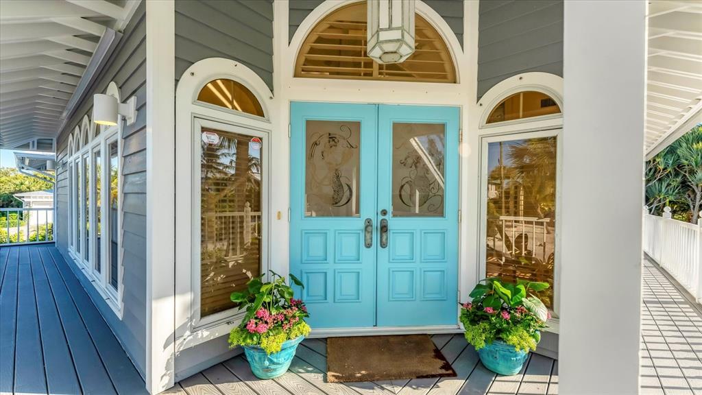 402 Lafitte Street Boca Grande, FL 33921 - Photo 3 of 40 a view of a door of the house