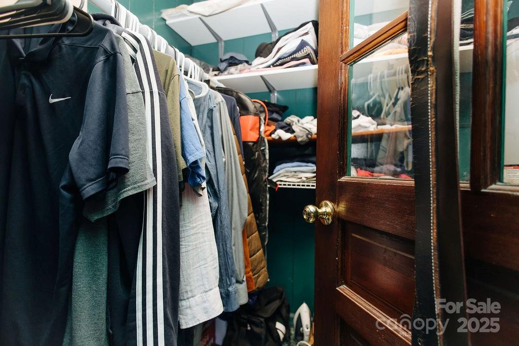 90 Long Street Marion, NC 28752 - Photo 14 of 34 a view of walk in closet with clothes and shoes