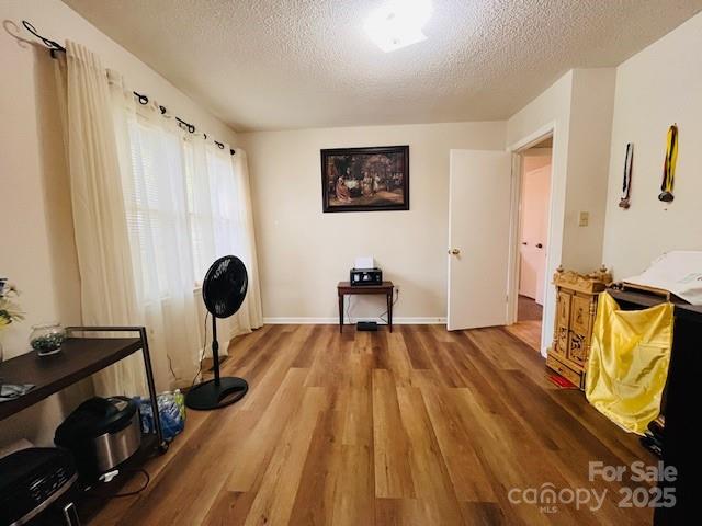 90 Long Street Marion, NC 28752 - Photo 16 of 34 a view of a room with wooden floor and bathroom