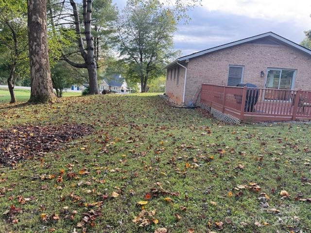 90 Long Street Marion, NC 28752 - Photo 26 of 34 a view of a house with a yard