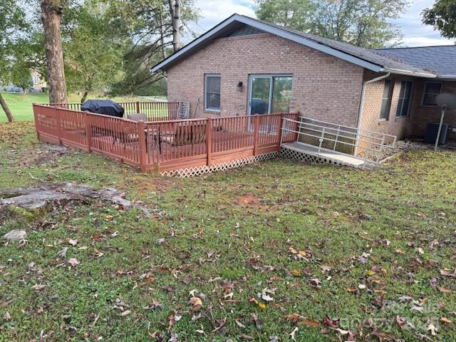 90 Long Street Marion, NC 28752 - Photo 31 of 34 a view of a house with a yard and wooden fence