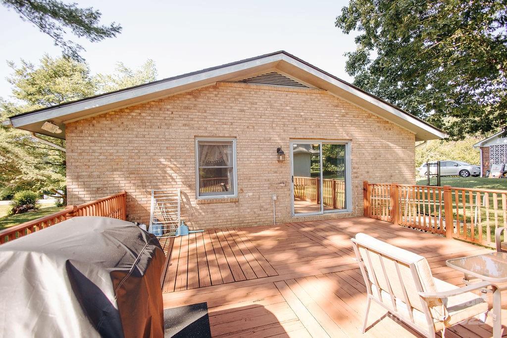 90 Long Street Marion, NC 28752 - Photo 5 of 34 a view of a house with a patio