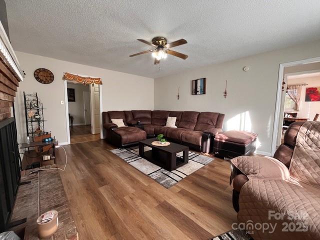 90 Long Street Marion, NC 28752 - Photo 8 of 34 a living room with furniture and a chandelier